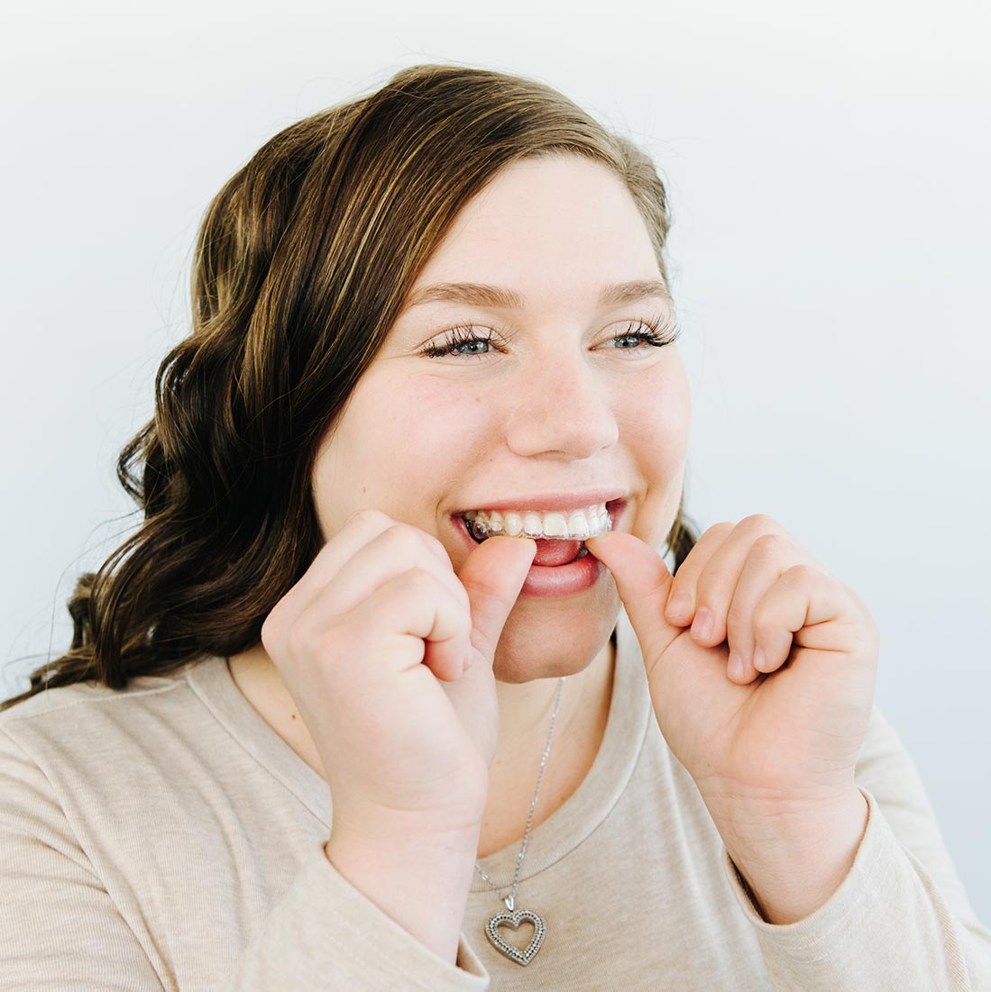 Girl trying out Invisalign